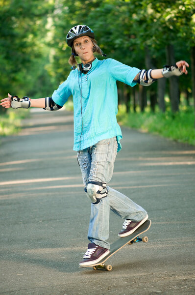 Teenage girl with skateboard