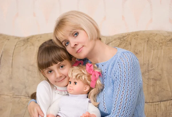 Mum and daughter with a doll — Stock Photo, Image