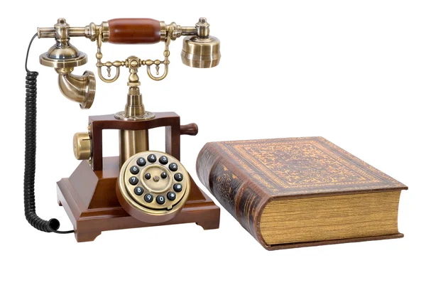 Ancient phone and book — Stock Photo, Image