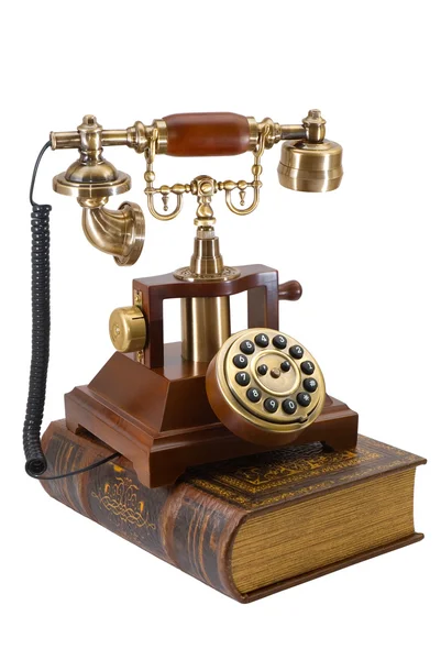 Ancient phone and book — Stock Photo, Image