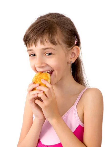 stock image The girl eats a patty