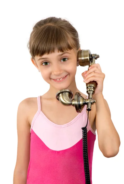 Девушка и древний телефон — стоковое фото