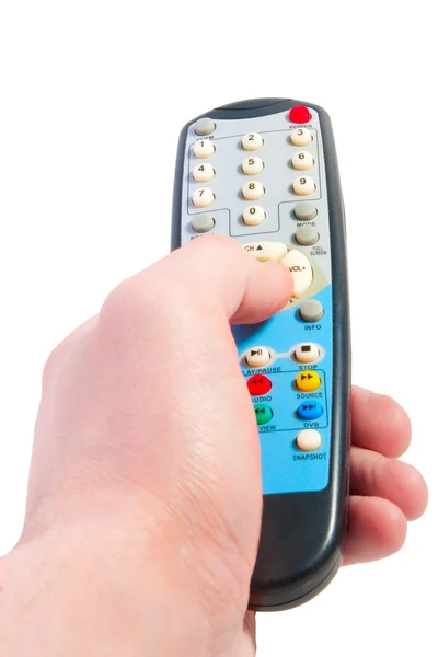 Hand som håller TV remote. — Stockfoto