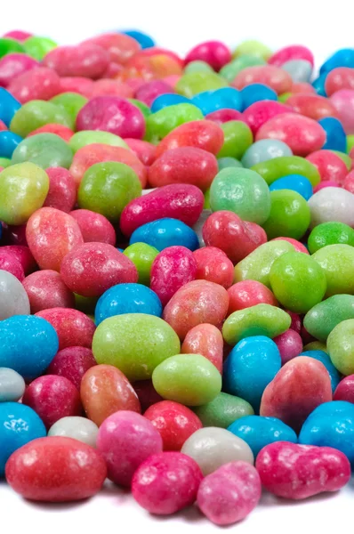 Разноцветные драже падение конфеты . — стоковое фото