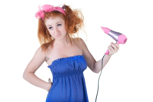 Red-haired girl with the hair dryer. — Stock Photo, Image