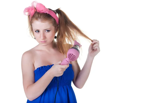 Red-haired girl with the hair dryer. — Stock Photo, Image