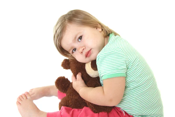 Cute baby girl with her teddy bear — Stock Photo, Image