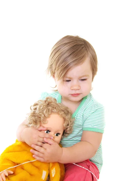 Menina bebê com sua boneca — Fotografia de Stock