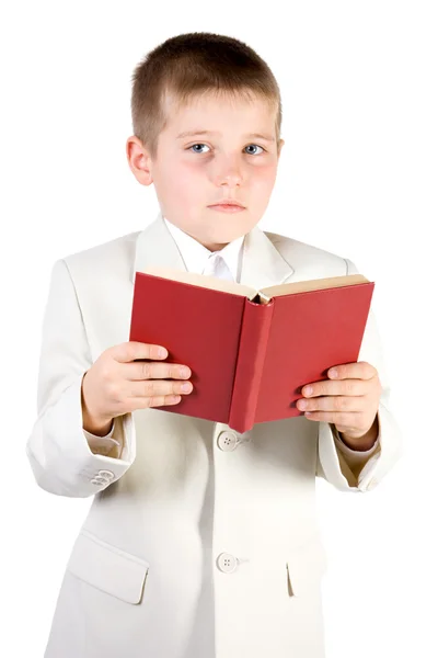 Ben vestito ragazzo leggere libro — Foto Stock