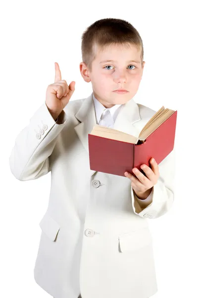 Välklädda pojke läsa bok — Stockfoto