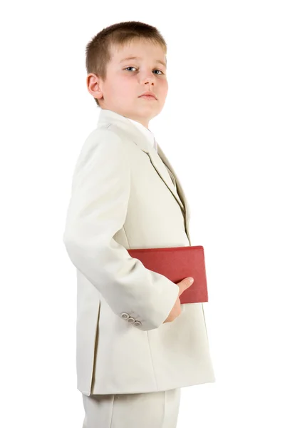Dobře oblečený hrdost chlapec drží knihu — Stock fotografie