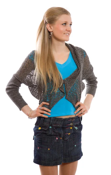 Симпатичная стройная девушка в джинсовой юбке — стоковое фото