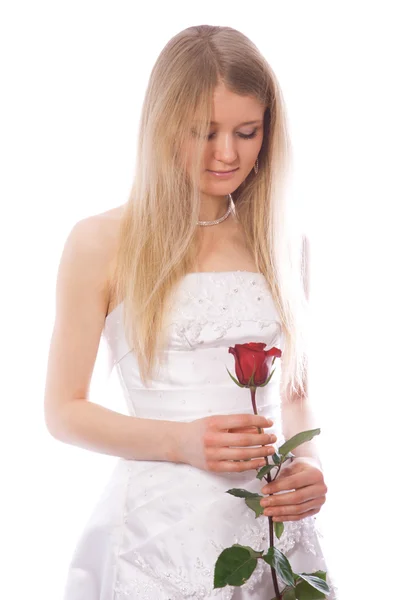 Mladí smutná nevěsta s červenou růží — Stock fotografie