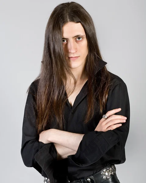 Young man with long hair Royalty Free Stock Images