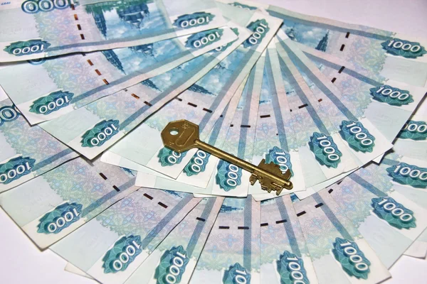 Russian money and the key — Stock Photo, Image