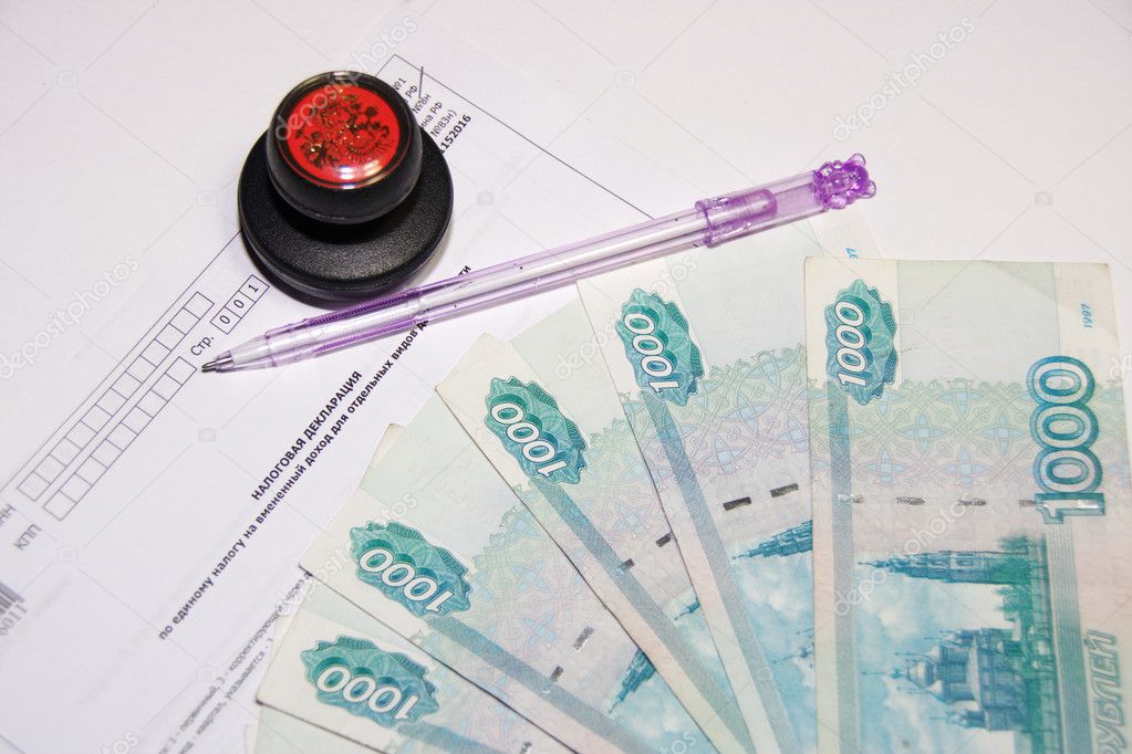 Russian money, tax return and pen