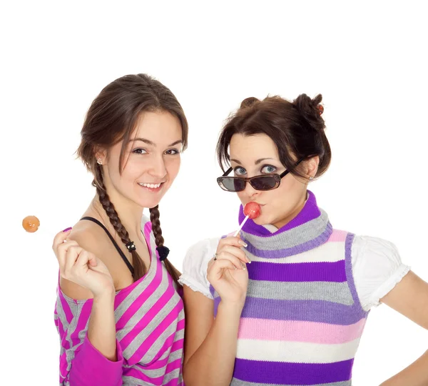 Attractive girls with lollipops — Stock Photo, Image