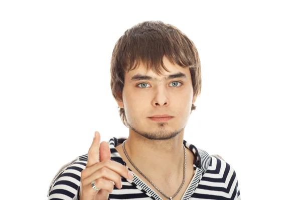 Attraktiver junger Mann zeigte mit dem Finger auf jemanden — Stockfoto