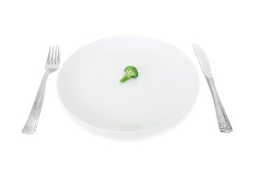 My diet, broccoli on a white plate clipart