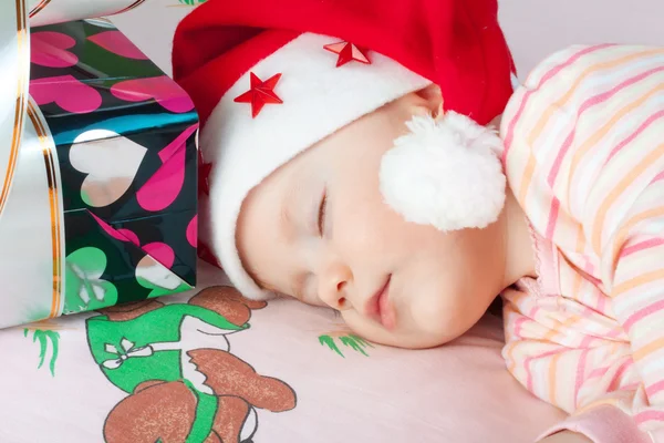 Noel baba bebek uyuyor — Stok fotoğraf