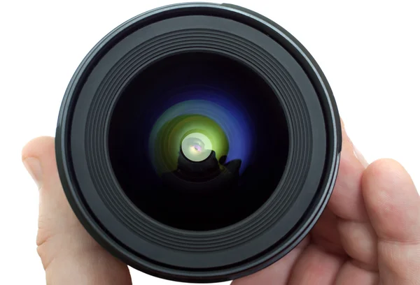 Bir elini lens — Stok fotoğraf