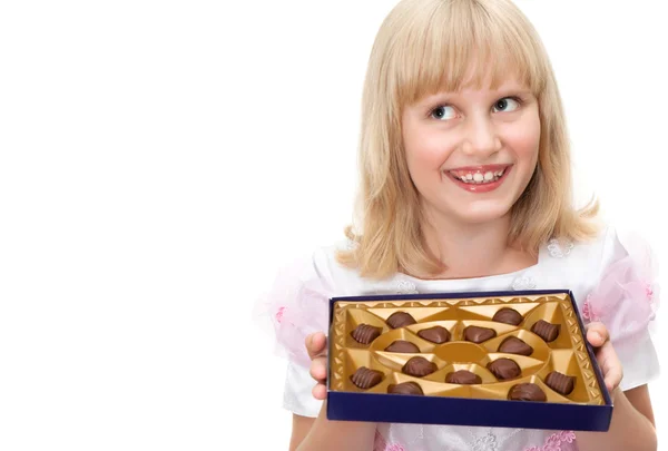 stock image Cute teen girl with chocolate candies box isolated on white