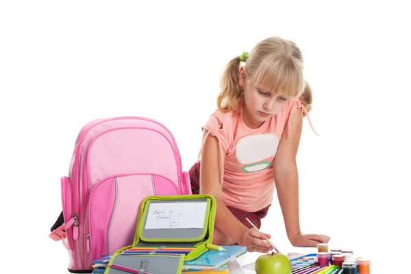 Voltar para a escola, menina e aparelhos escolares isolados em branco — Fotografia de Stock