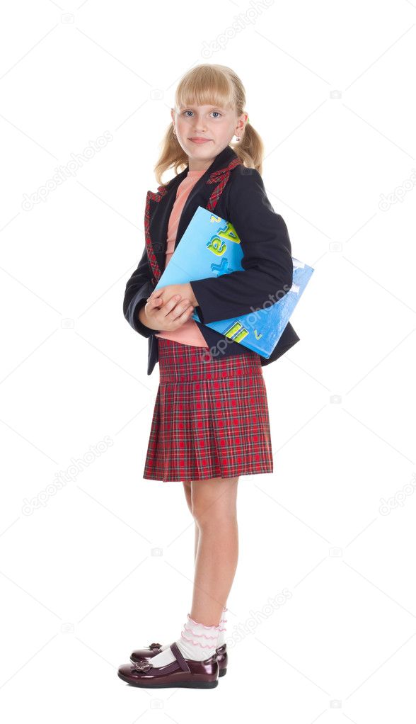 Happy schoolgirl with a book isolated on white