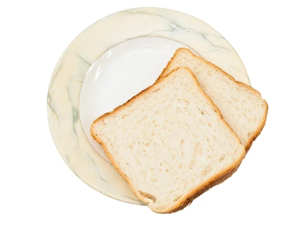 面包在盘子里 — 图库照片