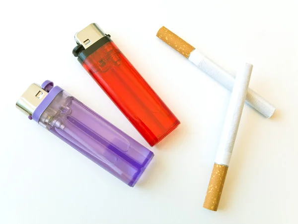 Två tändare och cigaretter — Stockfoto