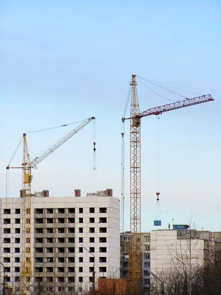 Buildings and cranes — Stock Photo, Image