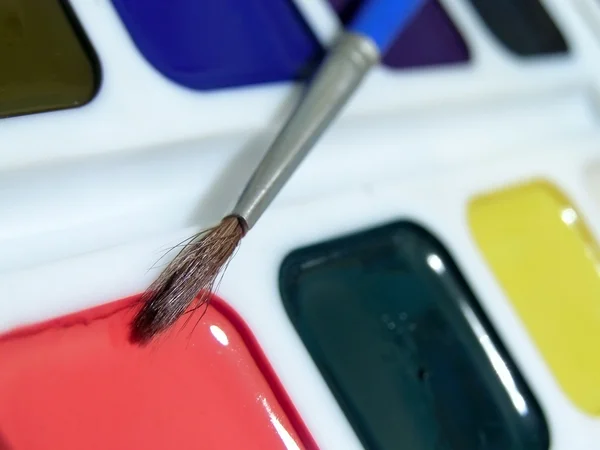 Mångfärgade aquarelle med pensel — Stockfoto