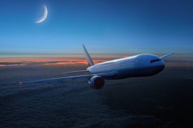 Airplane in the sky at night clipart