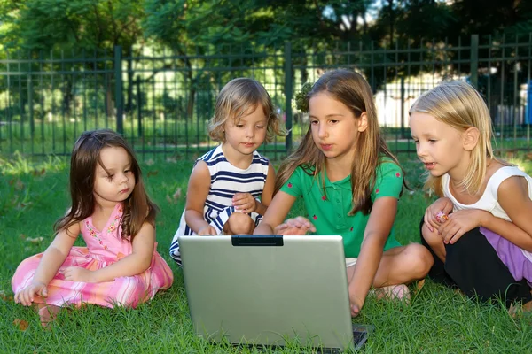 Four girls in the park — Stock Photo, Image