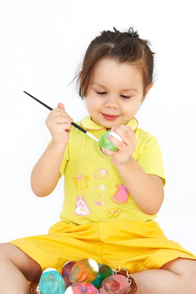 Girl painting easter egg — Stock Photo, Image
