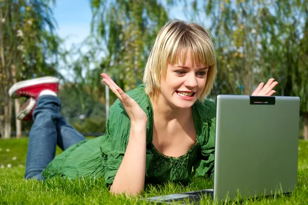 Woman in a park — Stock Photo, Image