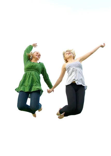 Meisjes springen in de lucht — Stockfoto