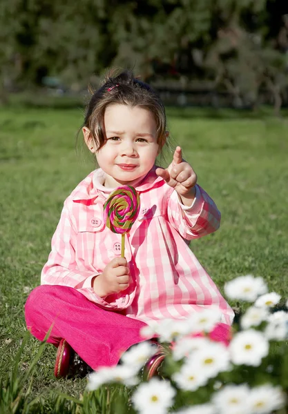 Flicka med lollipop cand — Stockfoto