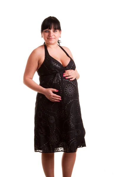 Schwangere im schwarzen Kleid — Stockfoto