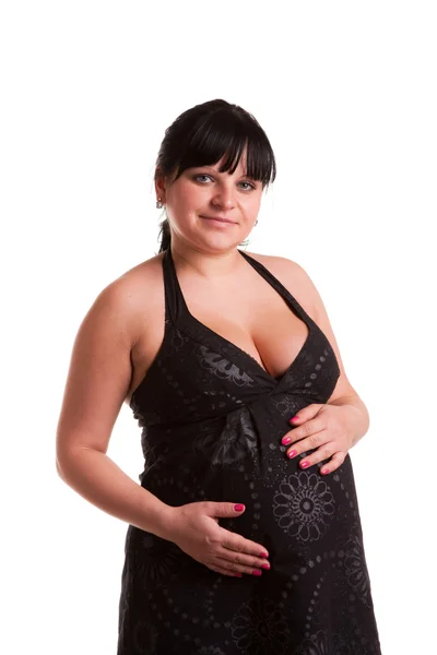 Terhes nő fekete ruhában. — Stock Fotó