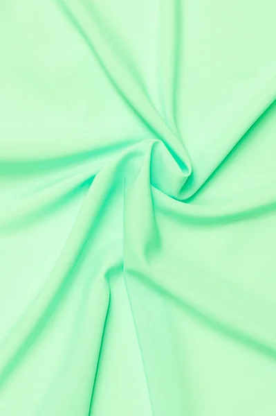Зеленый атласный фон — стоковое фото