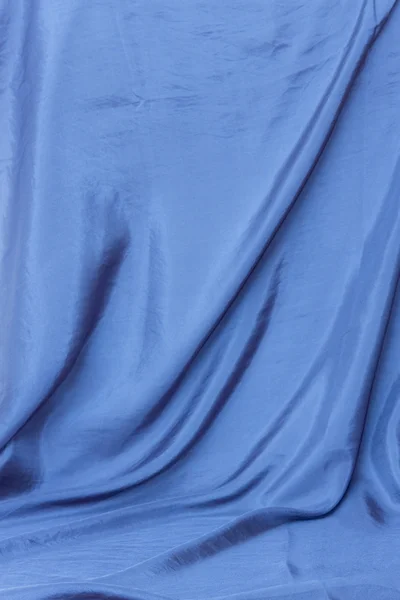 青いサテンの背景 — ストック写真