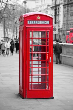 Red telephone booth in London clipart