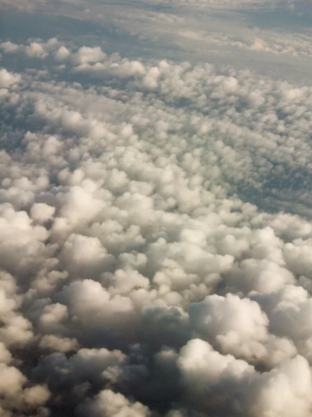 Popcorn Clouds above the earth — Stock Photo, Image