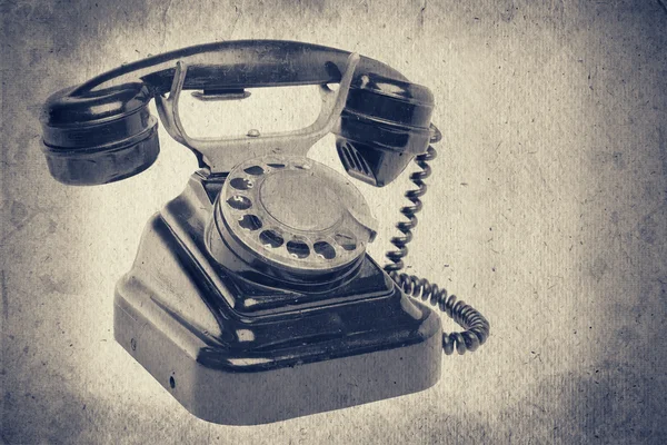 Eski vintage siyah telefon ile disk'i arar — Stok fotoğraf