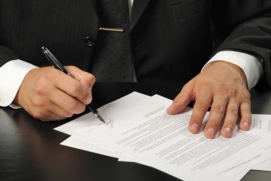 Businessman the signing contract clipart