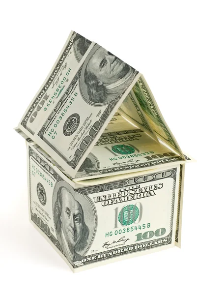 Dólar - la casa. Un diseño abstracto de dólares en forma de vivienda — Foto de Stock