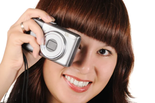 Дівчина з фотокамерою на білому тлі — стокове фото