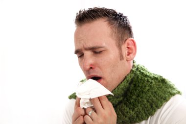 Man suffers from allergies or the flu. clipart