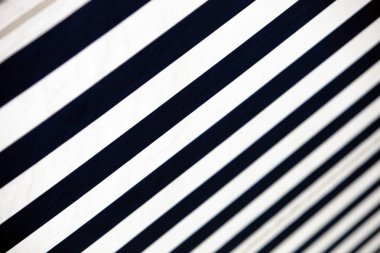 Blue-white- striped awning - close-up clipart
